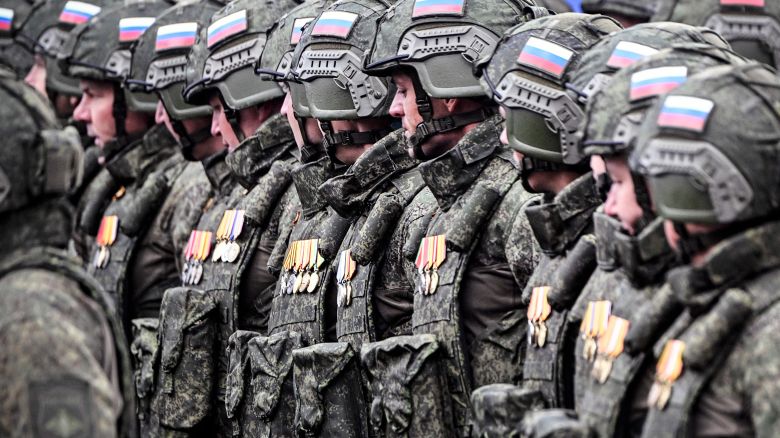 Russian servicemen involved in the country's military action in Ukraine march on Red Square during the Victory Day military parade in central Moscow on May 9, 2024.