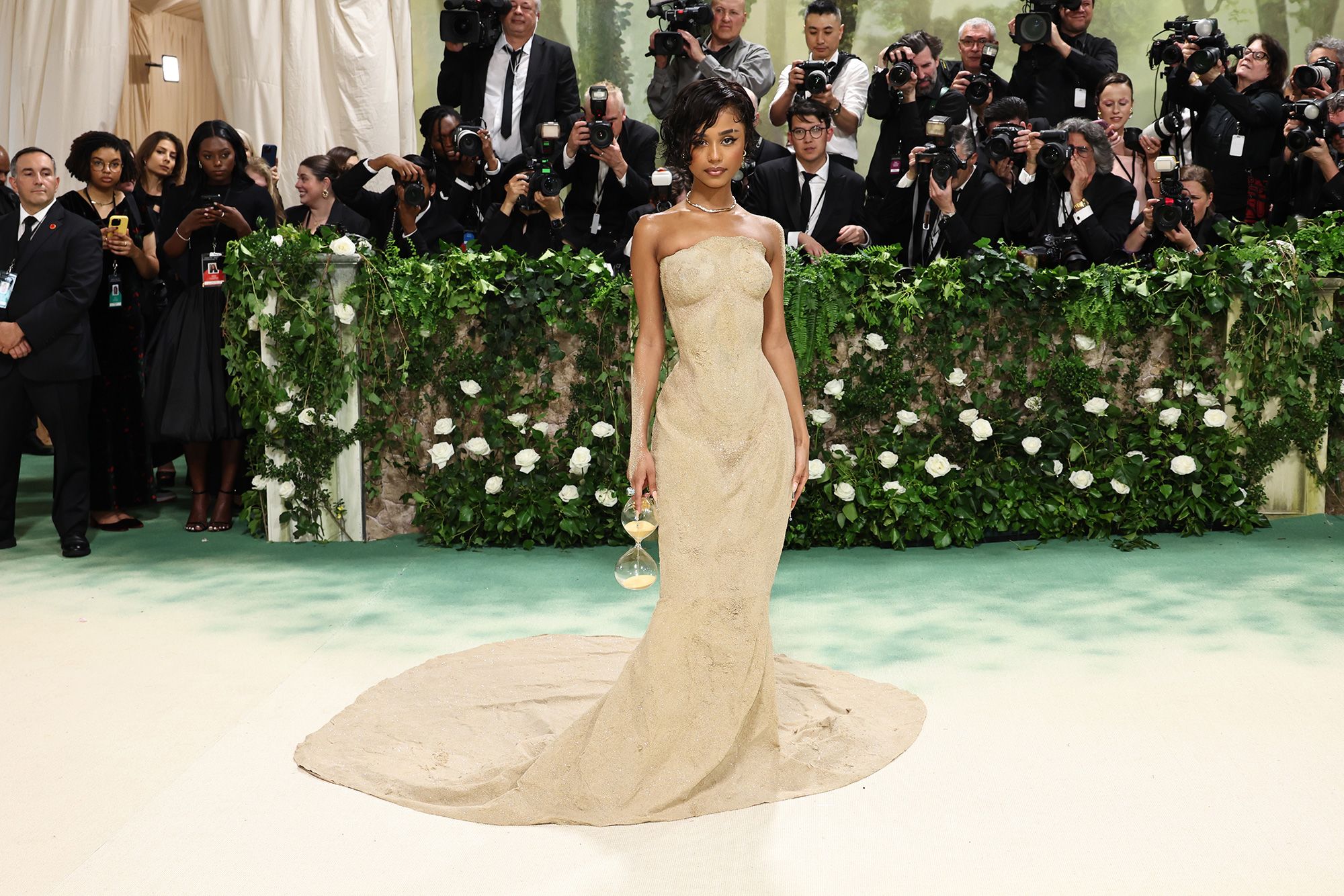 Tyla’s sculpted sand gown, created by Balmain from a plaster mold of her body, was one of the most talked-about looks of 2024. The singer had to be lifted up the stairs to the entrance of the Met.