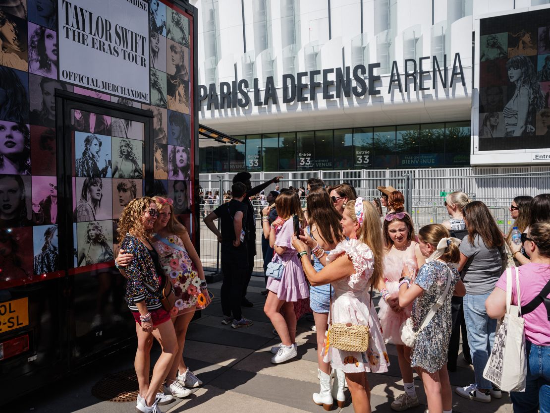 Taylor Swift fans taking photos before her concert in Nanterre, France, on May 10, 2024.