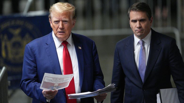 Former President Donald Trump, with attorney Todd Blanche (R) speaks to the media at the end of his day his criminal trial for allegedly covering up hush money payments at Manhattan Criminal Court on May 10, 2024 in New York City.