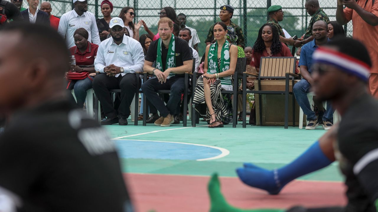 Britain's Prince Harry (CL), Duke of Sussex, and Britain's Meghan (CR), Duchess of Sussex, attend an exhibition sitting volleyball match at Nigeria Unconquered, a local charity organisation that supports wounded, injured, or sick servicemembers, in Abuja on May 11, 2024 as they visit Nigeria as part of celebrations of Invictus Games anniversary.