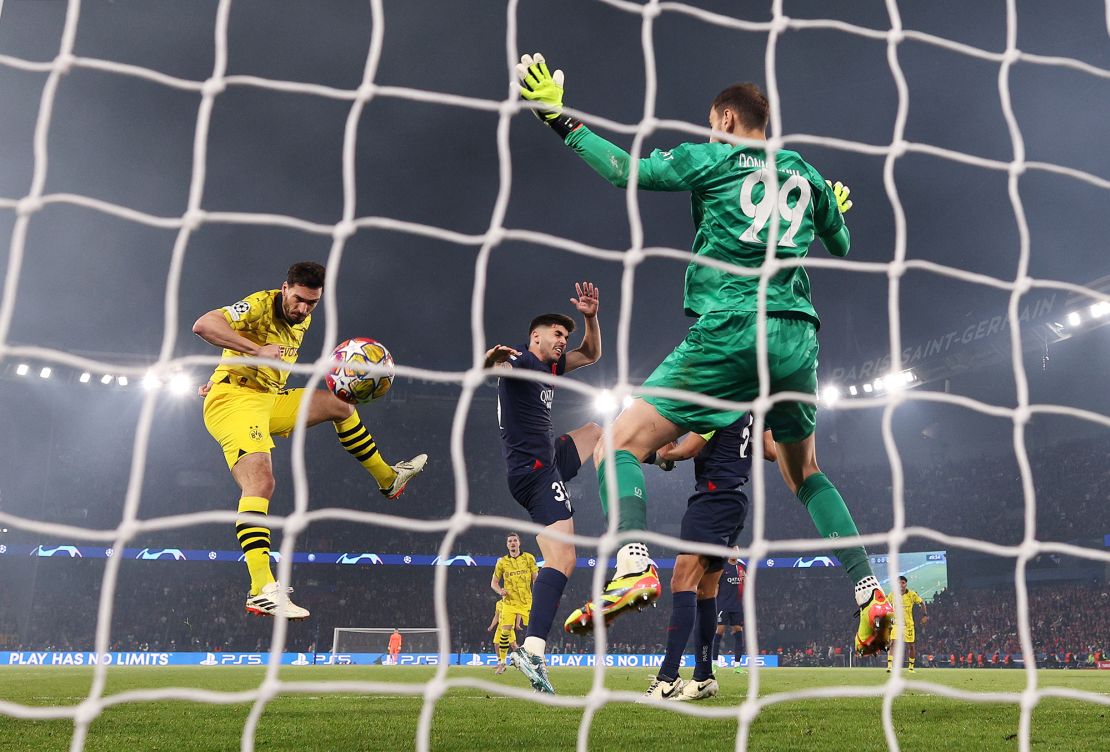 Mats Hummels scores for Borussia Dortmund against Paris Saint-Germain during the 2023/24 Champions League semifinal.