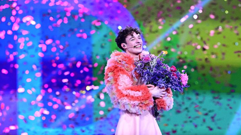 Swiss singer Nemo, representing Switzerland with the song "The Code," celebrates on stage after winning the 68th Eurovision Song Contest at the Malmo Arena in Malmo, Sweden on May 11, 2024.