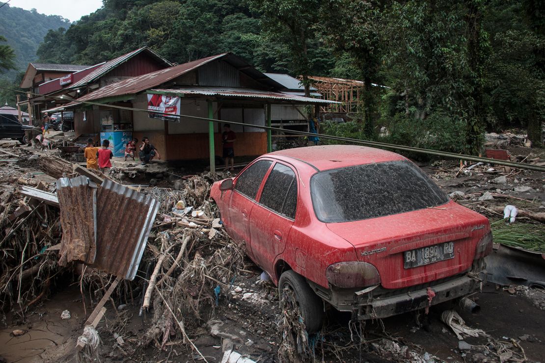 Strong mudslides wrecked devastation on many districts, including this village.