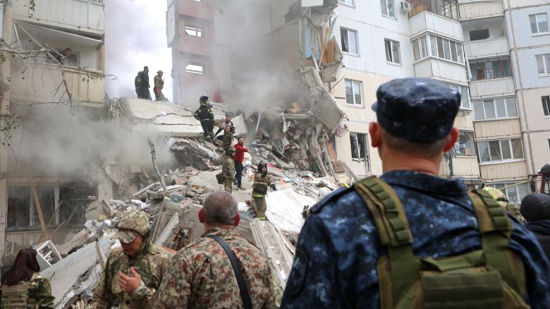Officials work on the site after an apartment collapsed in on May 12, 2024 in Belgorod, Russia.