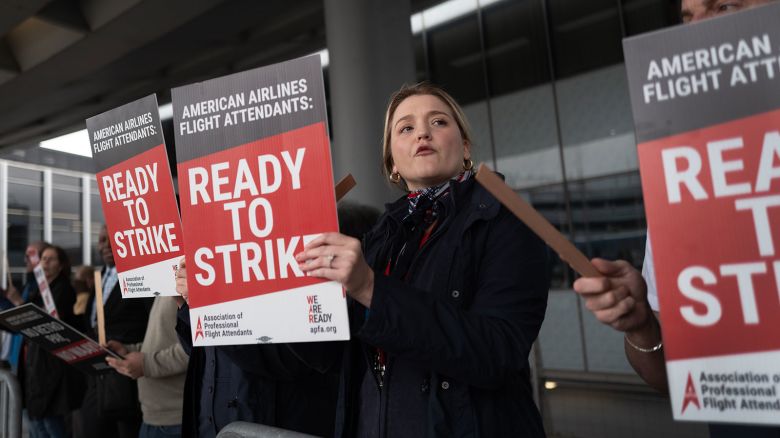 CHICAGO, ILLINOIS - MAY 09: American Airlines flight attendants picket outside O’Hare International Airport to demand higher wages on May 09, 2024 in Chicago, Illinois. According to union officials American Airlines flight attendants have not received a pay increase since 2019. (Photo by Scott Olson/Getty Images)