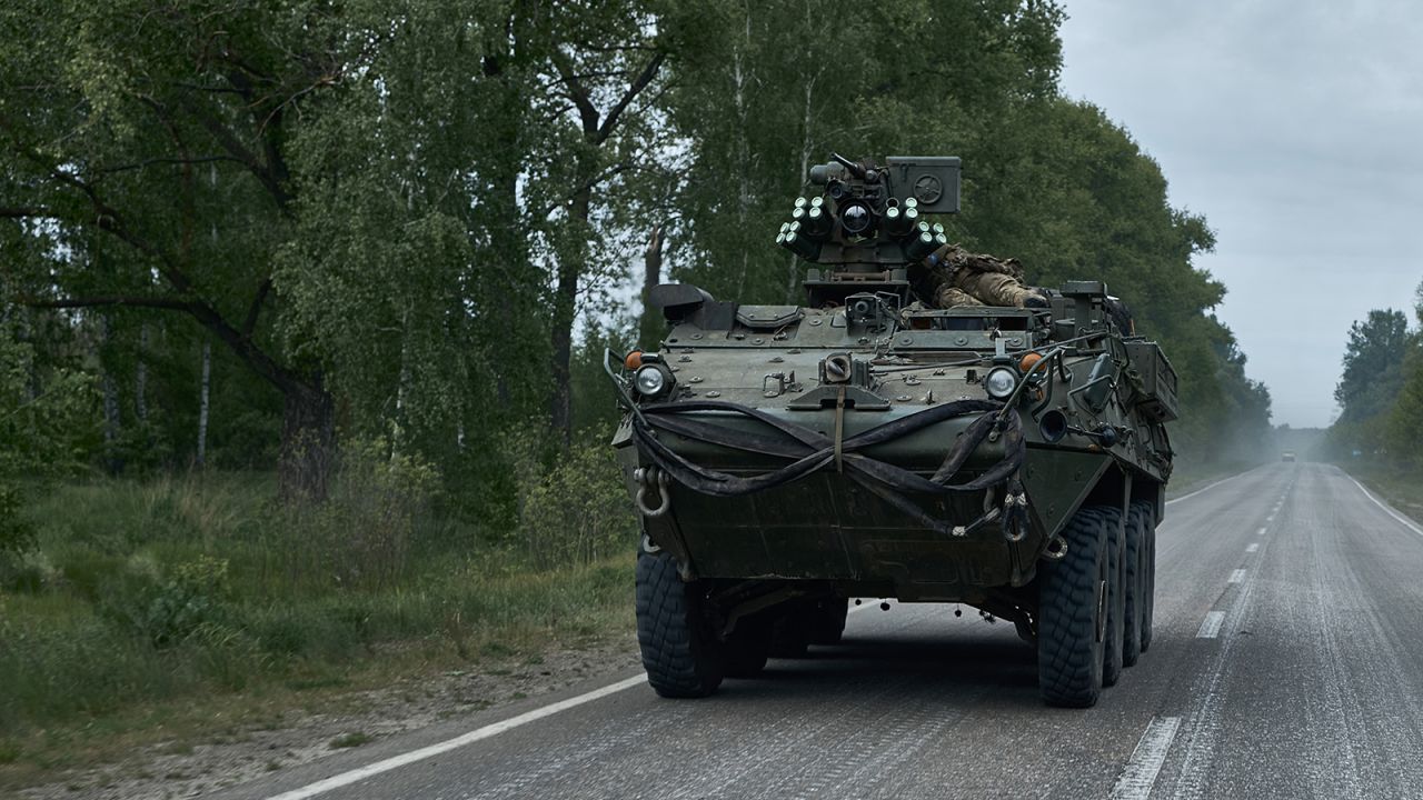 Armored vehicles are seen as the Kharkiv coordination volunteer center, together with the national police and emergency services conducts an evacuation from the pro-front city on the border with Russia on May 13, 2024 in Vovchansk Kharkiv Region, Ukraine.