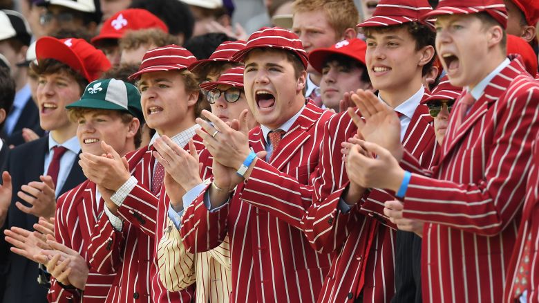 Students from Eton watch the annual Eton vs. Harrow match at Lord's Cricket Ground.