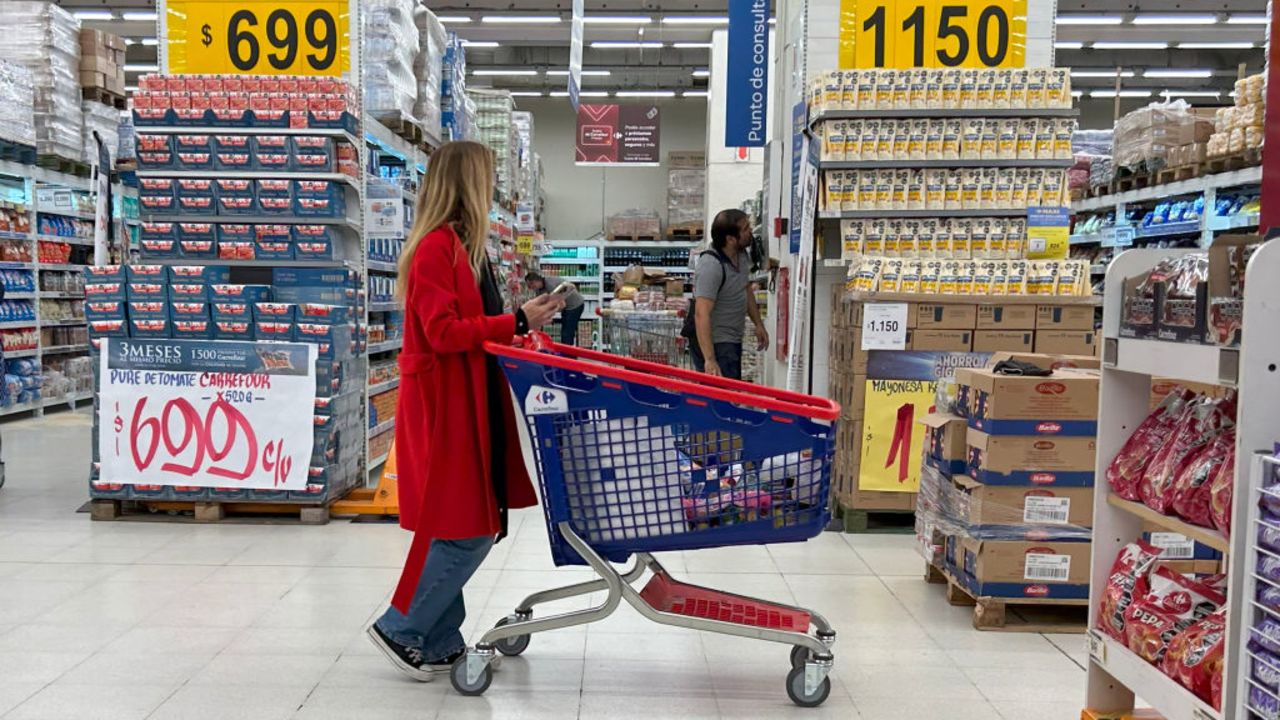 A woman buys groceries at a supermarket in Buenos Aires on May 14, 2024. Inflation in Argentina registered in April the fourth consecutive month of deceleration by standing at 8.8% monthly, the first single-digit rate in a semester, although it remains high at 289.4% year-on-year, the statistics institute, Indec, reported on Tuesday. (Photo by STRINGER / AFP) (Photo by STRINGER/AFP via Getty Images)