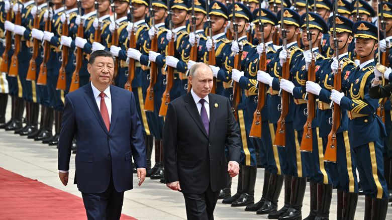 Russian President Vladimir Putin and Chinese leader Xi Jinping attend an official welcoming ceremony in front of the Great Hall of the People in Tiananmen Square in Beijing on May 16, 2024.