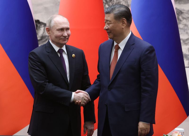BEIJING, CHINA - MAY 16: (RUSSIA OUT) Russian President Vladimir Putin (L) and Chinese President Xi Jinping (R) shake hands during a bilateral meeting on May 16, 2024 in Beijing, China. Russian President Vladimir Putin is in China for a two-day state visit. (Photo by Contributor/Getty Images)