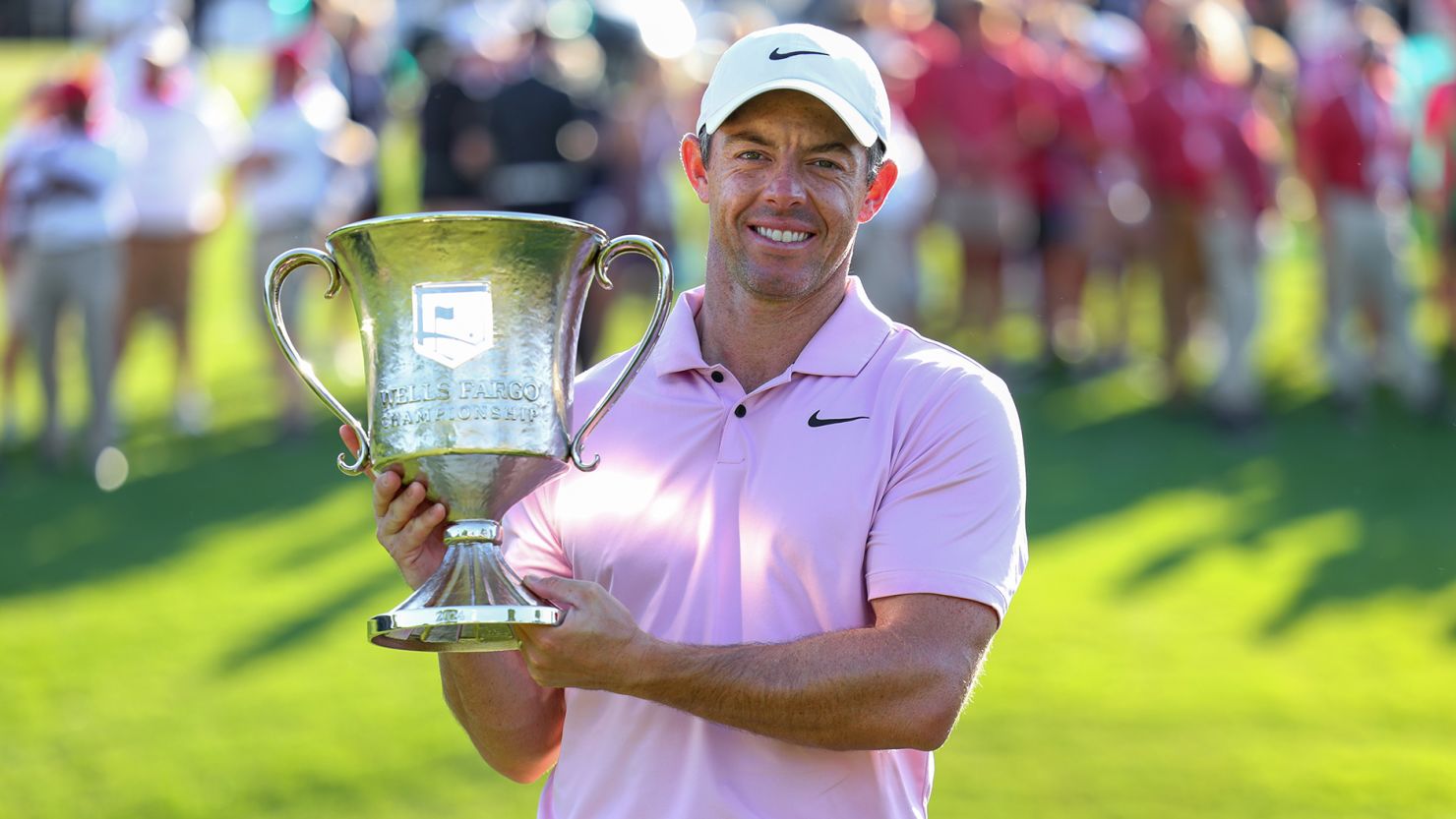 Rory McIlroy celebrates with the trophy after winning the 2024 Wells Fargo Championship at Quail Hollow Club in Clifton, North Carolina.