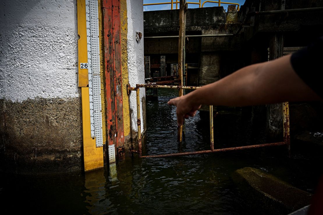 Ricardo Guete of the Operational Hydrology department monitors the water levels of Lake Gatun in the Panama Canal, Panama on May 14, 2024.