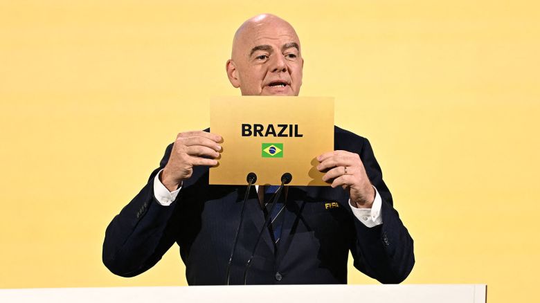 FIFA President Gianni Infantino announces Brazil as the hosts of the 2027 Women's World Cup during the 74th FIFA Congress in Bangkok on May 17, 2024. The 74th FIFA Congress is taking place in Bangkok with member associations voting on a range of issues including confirmation of the host nation or nations for the 2027 women's football World Cup. (Photo by Manan VATSYAYANA / AFP) (Photo by MANAN VATSYAYANA/AFP via Getty Images)