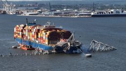BALTIMORE, MARYLAND - MAY 13: In this aerial view, a steel truss from the destroyed Francis Scott Key Bridge that was pinning the container ship Dali in place was detached from the ship using a controlled detonation of explosives in the Patapsco River on May 13, 2024 in Baltimore, Maryland. An estimated 500-foot section of the bridge weighing 8-12 million pounds was removed by controlled demolition in the final stage of wreckage removal for the ship to be moved into port. On March 26th the Dali crashed into the Key Bridge causing it to collapse killing six construction workers. (Photo by Chip Somodevilla/Getty Images)