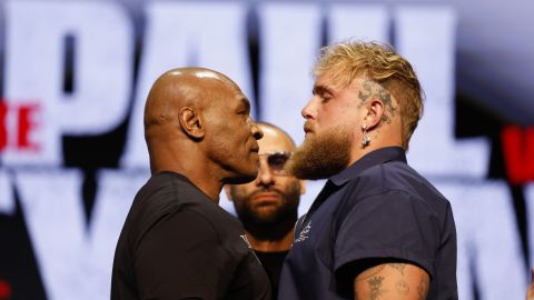 NEW YORK, NEW YORK - MAY 13: (L-R) Mike Tyson and Jake Paul speak onstage at the press conference in promotion for the upcoming Jake Paul vs. Mike Tyson boxing match at The Apollo Theater on May 13, 2024 in New York City. (Photo by Sarah Stier/Getty Images for Netflix)