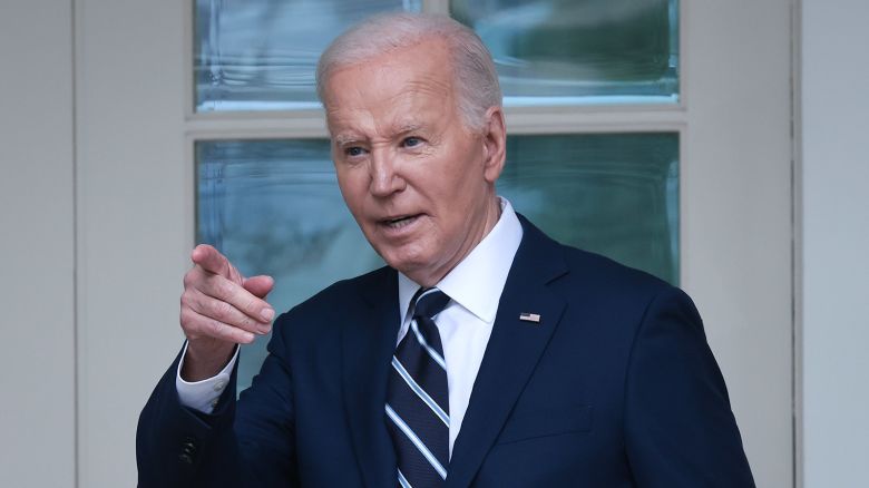 President Joe Biden returns to the Oval Office after speaking in the Rose Garden of the White House on May 14, 2024.