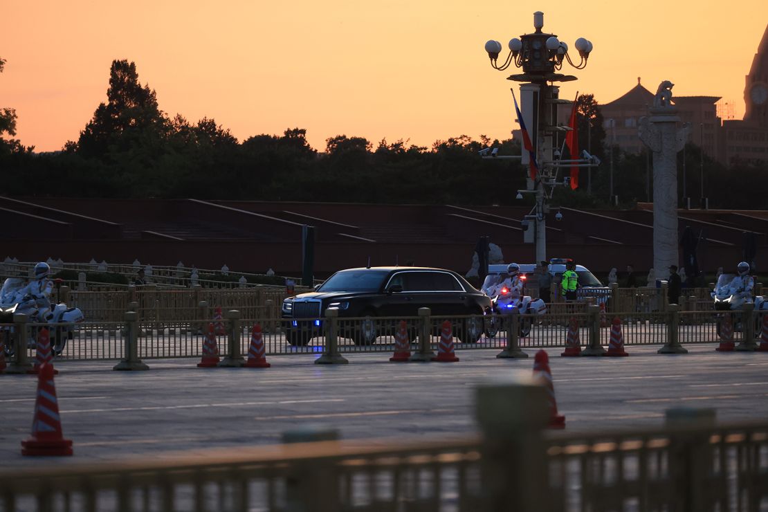 The convoy of Russian President Vladimir Putin passes by Beijing's Tiananmen Square on Wednesday.