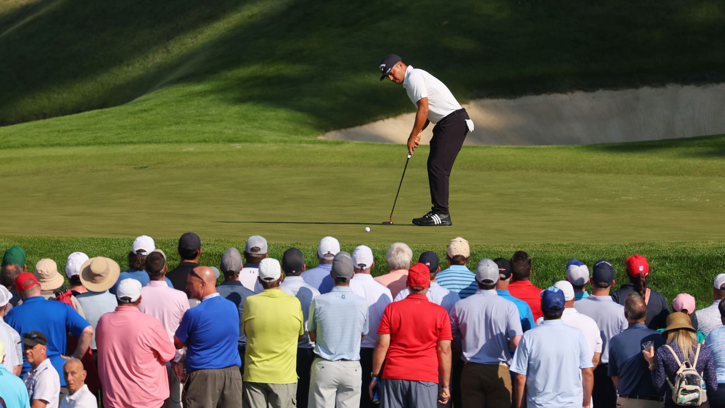 Xander Schauffele putts on the 14th green during the first round of the 2024 PGA Championship at Valhalla Golf Club in Louisville, Kentucky.