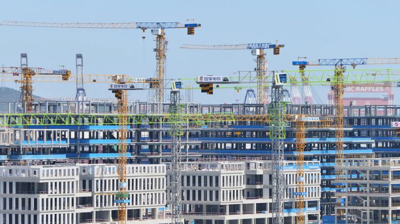 Tower cranes are seen at a real estate construction site in Yantai, Shandong province, China, on May 19, 2024.