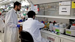 Cambridge, MA - May 14: From left, Jon Arizti Sanz, PhD, Postdoctoral Fellow with  Liam Alec Stenson Ortiz, research associate working in the lab. The Broad institute, Sabeti Lab is testing purchased milk at area grocery stores for the presence of bird flu. (Photo by David L. Ryan/The Boston Globe via Getty Images)