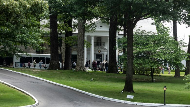 MEMPHIS, TENNESSEE - MAY 22: Tourists prepare to enter Graceland, the home of Elvis Presley, on May 22, 2024 in Memphis, Tennessee. Actress Riley Keough, granddaughter of Elvis Presley, is in a dispute with a company that claimed ownership of the mansion after saying his estate failed to repay a loan, Keough inherited Graceland and much of Presley's estate after her mother, Lisa Marie Presley, died last year.  (Photo by Brad Vest/Getty Images)