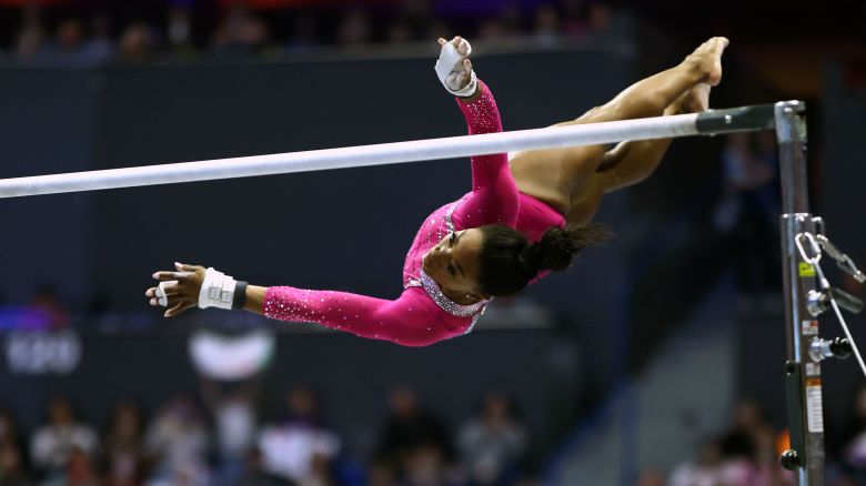 HARTFORD, CONNECTICUT - MAY 18: Simone Biles performs on the uneven bars during the 2024 Core Hydration Classic at XL Center on May 18, 2024 in Hartford, Connecticut. (Photo by Tim Nwachukwu/Getty Images)