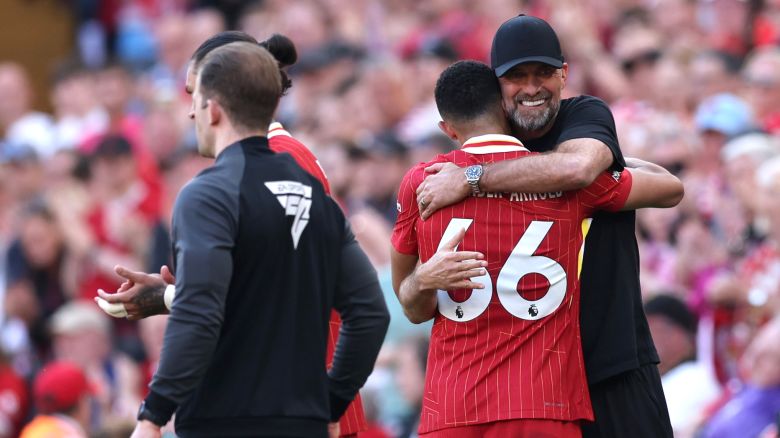 Jurgen Klopp, Manager of Liverpool, embraces Trent Alexander-Arnold of Liverpool after he is substituted during the Premier League match between Liverpool FC and Wolverhampton Wanderers at Anfield on May 19, 2024 in Liverpool, England.