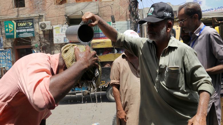 A man tries to cool himself off as temperatures reached 46 to 48 degrees Celsius in Hyderabad, Pakistan on May 24, 2024.