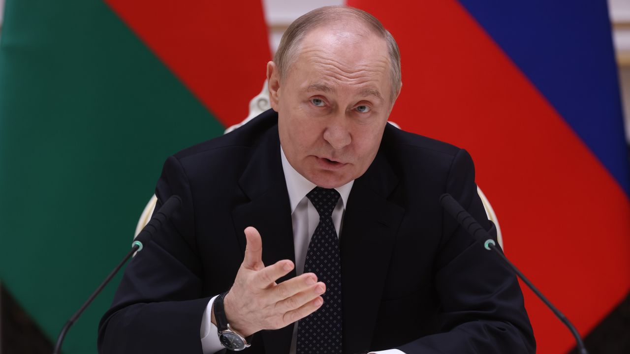Russian President Vladimir Putin gestures during a joint press conference after Russian-Belarusian talks at the Palace of Independence, on May 24, 2024, in Minsk, Belarus. Vladimir Putin is having a two-day visit to Belarus.