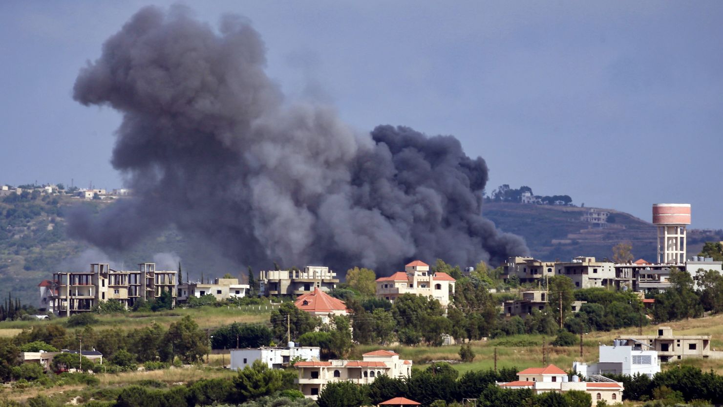 Smoke billows from the site of an Israeli airstrike on the Lebanese village of Jebbain on May 25, 2024, amid ongoing cross-border clashes between Israeli troops and Hezbollah fighters.