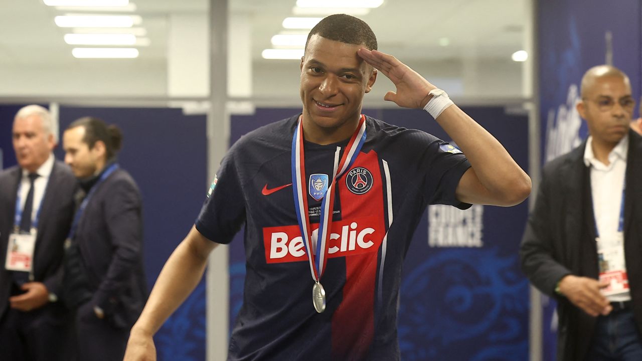 TOPSHOT - Paris Saint-Germain's French forward #07 Kylian Mbappe gestures in the tunnel after playing his final match for Paris Saint-Germain (PSG) at the end of the French Cup Final football match against Olympique Lyonnais (OL) at the Stade Pierre-Mauroy, in Villeneuve-d'Ascq, northern France on May 25, 2024. The game was the club's top scorer's 308th and final appearance for his hometown club, for whom he signed in August 2017 from Monaco in a 180 million-euro deal. (Photo by FRANCK FIFE / AFP) (Photo by FRANCK FIFE/AFP via Getty Images)