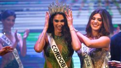 Miss Universe Cordoba 2024 Magaly Benejam (L) is crowned Miss Universe Argentina 2024 by Miss Universe Argentina 2023, Yamile Dajud, during the final of Miss Universe Argentina beauty contest in Buenos Aires on May 25, 2024. The winner was the representative of the province of Cordoba, Magaly Benejam, 29, who will represent Argentina in Miss Universe International 2024 to be held in Mexico next September. (Photo by LUIS ROBAYO / AFP) (Photo by LUIS ROBAYO/AFP via Getty Images)