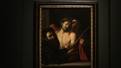 A painting by Italian master Caravaggio entitled 'Ecce Homo' is pictured at the Prado museum in Madrid, on May 27, 2024. A painting by Italian master Michelangelo Merisi da Caravaggio, known as Caravaggio, once mistakenly thought to be by an unknown artist and almost auctioned off with an opening price of 1,500 euros, has been unveiled at the Prado museum. Entitled "Ecce Homo", the dark canvas depicting a bloodied Jesus wearing a crown of thorns just before his crucifixion, is one of around only 60 known works by the Renaissance artist. (Photo by PIERRE-PHILIPPE MARCOU / AFP) / RESTRICTED TO EDITORIAL USE - MANDATORY MENTION OF THE ARTIST UPON PUBLICATION - TO ILLUSTRATE THE EVENT AS SPECIFIED IN THE CAPTION (Photo by PIERRE-PHILIPPE MARCOU/AFP via Getty Images)