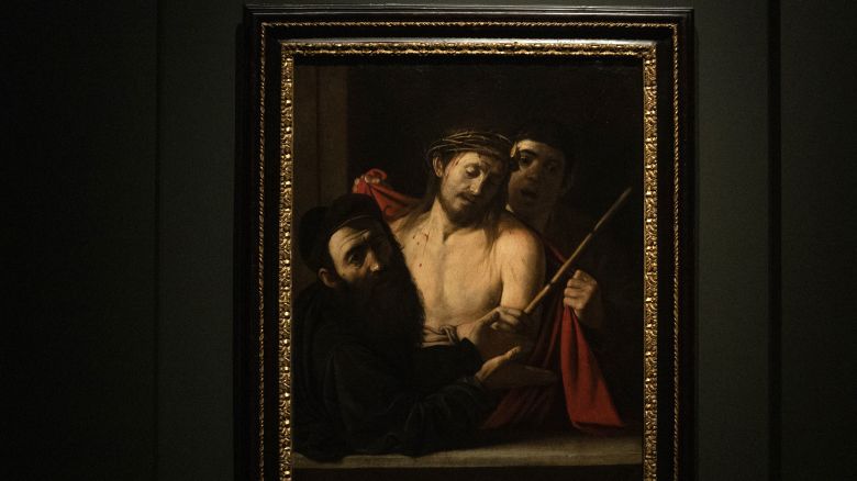A painting by Italian master Caravaggio entitled 'Ecce Homo' is pictured at the Prado museum in Madrid, on May 27, 2024. A painting by Italian master Michelangelo Merisi da Caravaggio, known as Caravaggio, once mistakenly thought to be by an unknown artist and almost auctioned off with an opening price of 1,500 euros, has been unveiled at the Prado museum. Entitled "Ecce Homo", the dark canvas depicting a bloodied Jesus wearing a crown of thorns just before his crucifixion, is one of around only 60 known works by the Renaissance artist. (Photo by PIERRE-PHILIPPE MARCOU / AFP) / RESTRICTED TO EDITORIAL USE - MANDATORY MENTION OF THE ARTIST UPON PUBLICATION - TO ILLUSTRATE THE EVENT AS SPECIFIED IN THE CAPTION (Photo by PIERRE-PHILIPPE MARCOU/AFP via Getty Images)