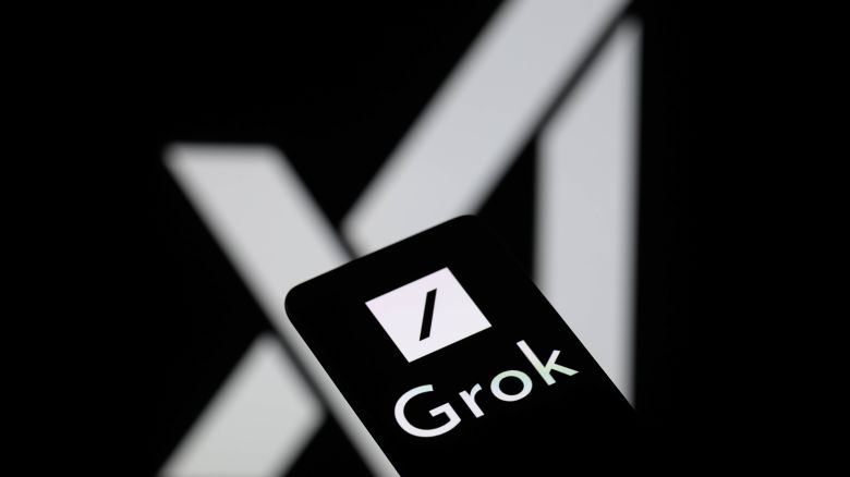 The Grok logo is being displayed on a smartphone with the X AI icon visible in the background in this photo illustration in Brussels, Belgium, on May 27, 2024. (Photo by Jonathan Raa/NurPhoto via Getty Images)
