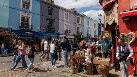 Tourists throng London's Portobello Road. (photo by Mark Kerrison/In Pictures via Getty Images)