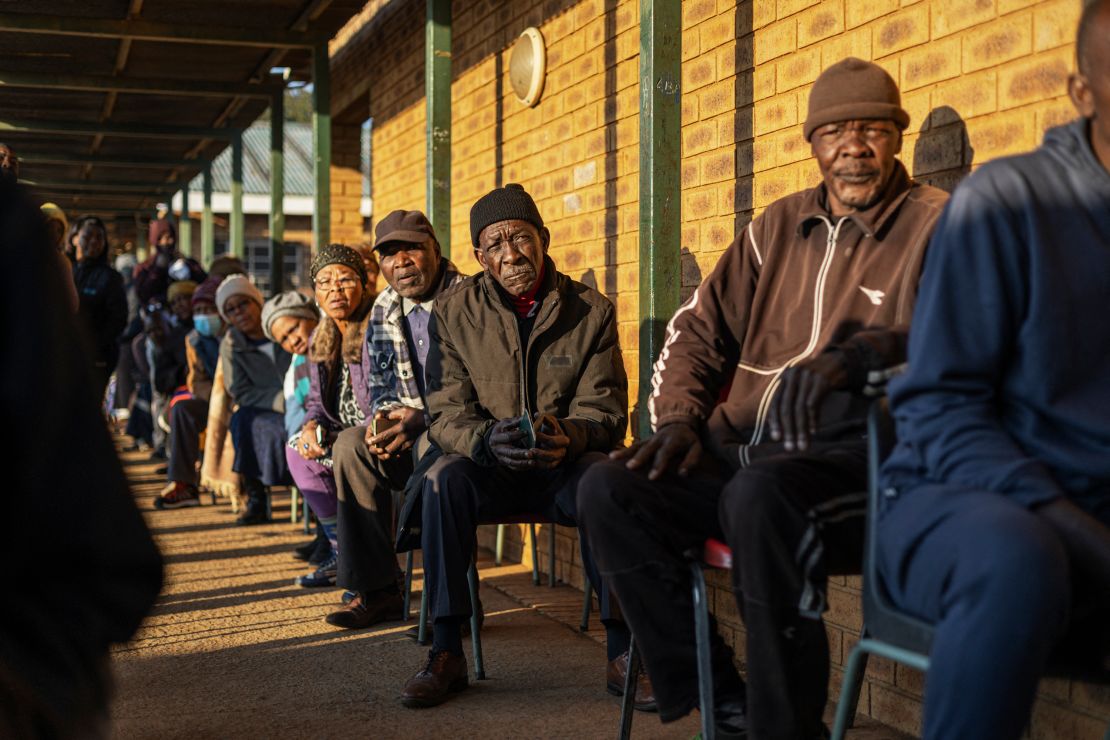 Voters wait in line at the Intlonipho Primary School polling station in Orange Farm, south of Johannesburg, on May 29, 2024, during South Africa's general election. The ruling ANC lost its majority in the most competitive election since the end of apartheid.
