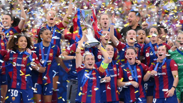 Barcelona lifts the Women's Champions League trophy.