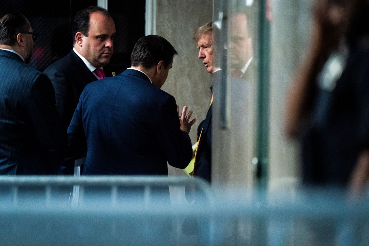 Boris Epshteyn and President-elect Donald Trump are seen at Manhattan criminal court in New York, on May 29.