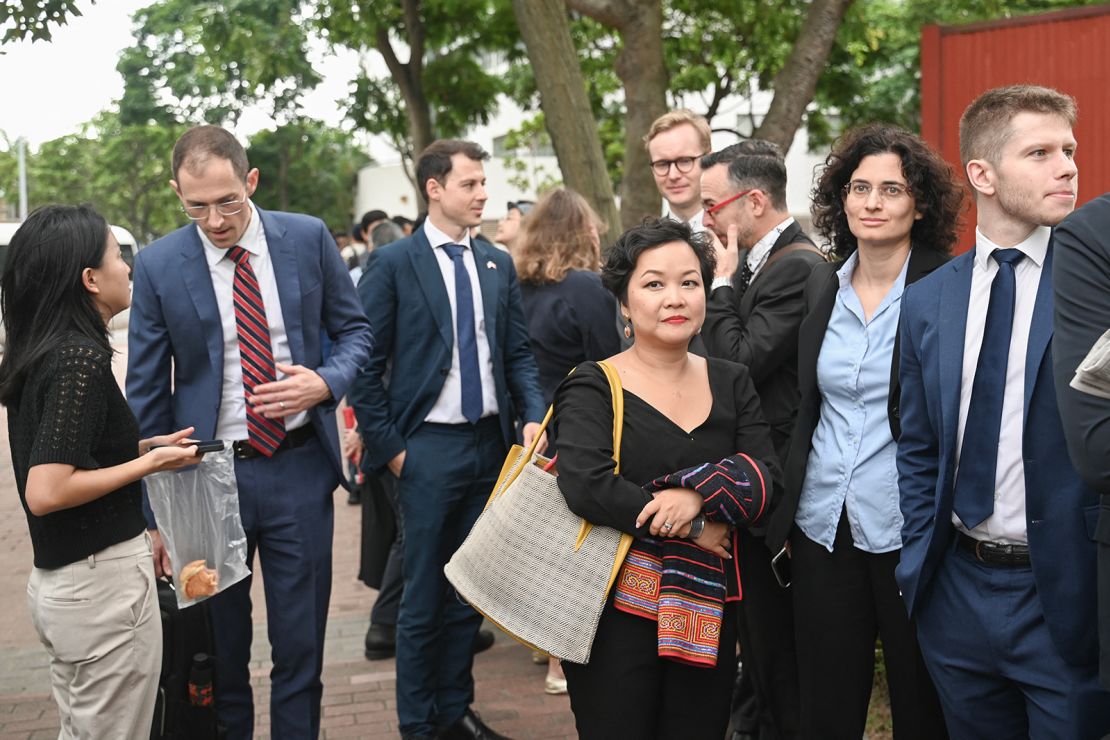 Foreign diplomats are among the about 200 members of public queuing outside the court on Thursday morning.