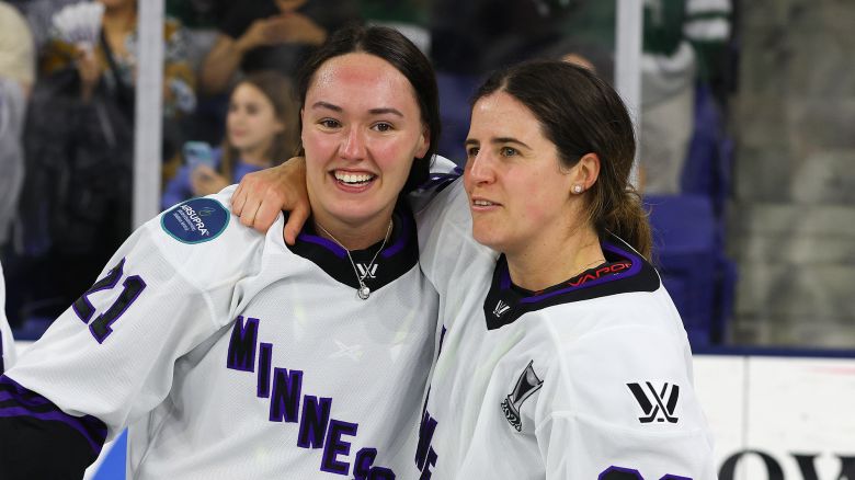 LOWELL, MA - MAY 29: Minnesota forward Liz Schepers (21) and Minnesota forward Michela Cava (86) celebrate after defeating Boston in game 5 to win the PWHL Walter Cup championship on May 29, 2024, at Tsongas Center in Lowell, MA. (Photo by M. Anthony Nesmith/Icon Sportswire via Getty Images)
