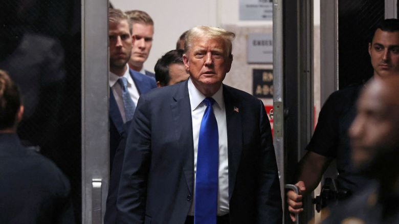 Former US President and Republican presidential candidate Donald Trump returns to the courtroom during his criminal trial at Manhattan Criminal Court in New York City, on May 30, 2024. The jury in Donald Trump's hush money trial announced May 30, 2024 in a note to the court that it has reached a verdict, indicating that this would be delivered in less than an hour. (Photo by Michael M. Santiago / POOL / AFP) (Photo by MICHAEL M. SANTIAGO/POOL/AFP via Getty Images)