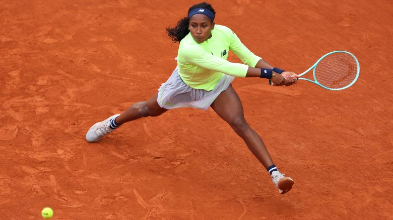 PARIS, FRANCE - MAY 27: Coco Gauff of United States stretches for a backhand against Julia Avdeeva in the Women's Singles first round match on Day Two of the 2024 French Open at Roland Garros on May 27, 2024 in Paris, France. (Photo by Dan Istitene/Getty Images)