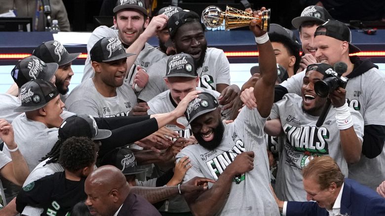Jaylen Brown of the Boston Celtics accepts the The Larry Bird Trophy, earning the Eastern Conference Finals MVP, after winning Game Four of the Eastern Conference Finals at Gainbridge Fieldhouse on May 27, 2024 in Indianapolis, Indiana.
