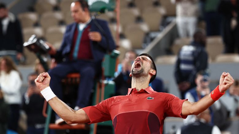 Serbia's Novak Djokovic celebrates after winning against Italy's Lorenzo Musetti at the end of their men's singles match on Court Philippe-Chatrier at the Roland Garros Complex in Paris on June 2, 2024.
