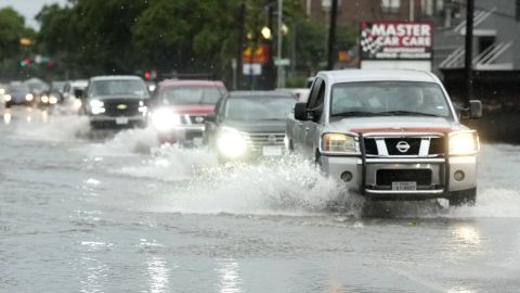 HOUSTON, TEXAS - MAY 28: Drivers navigate high water on Yale Street in the Heights after a strong storm blew in on Tuesday, May 28, 2024, in Houston. (Karen Warren/Houston Chronicle via Getty Images)