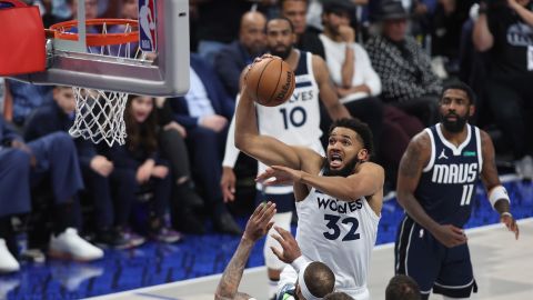 Karl-Anthony Towns drives to the basket against the Dallas Mavericks during Game 4 of the Western Conference finals.