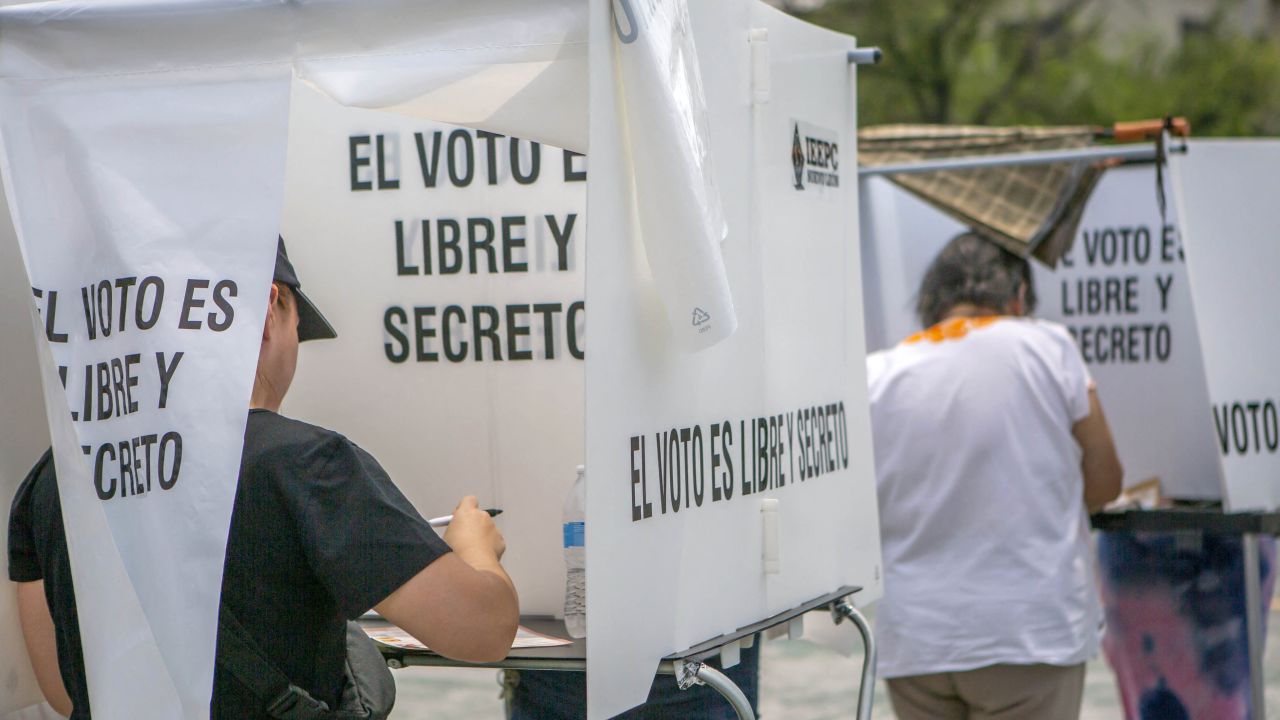 People vote in Monterrey, Nuevo Leon State, Mexico, during the general election on June 2, 2024. Mexicans voted for a new president Sunday in a contest dominated by women -- a historic first that was overshadowed by election day violence in the crime-plagued Latin American nation. (Photo by Julio Cesar AGUILAR / AFP) (Photo by JULIO CESAR AGUILAR/AFP via Getty Images)