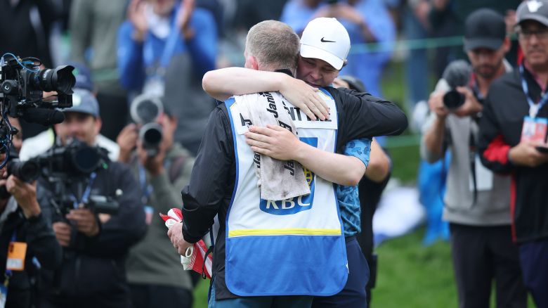 HAMILTON, ON - JUN 02:Doug (L) Robert MacIntyre (R) hug after as the father son duo get it done. Final-round 2-under 68 at the 2024 RBC Canadian Open, Robert MacIntyre talks about what it means to win his first PGA TOUR event and the importance of doing it with his father, Dougie, on the bag for the first time.(Photo by R.J. Johnston/Toronto Star via Getty Images)